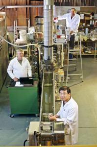 Mr Lance Nichols, Dr Graeme Moad and Dr Guoxin Li with the ‘extruder’ at CSIRO (Credit: Paul Phillipson Photography)