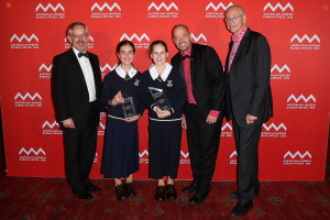 SYDNEY, AUSTRALIA - AUGUST 26:  Trevor Hambley, Adam Spencer and Dr Karl Kruszelnicki present Ella Woods and Georgia Souyave-Murphy of St Margaret's Anglican Girls School Brisbane with first place in the 'University of Sydney Sleek Geeks Science Eureka Prize - Primary' at the Australian Museum Eureka Prizes 2015 at Sydney Town Hall on August 26, 2015 in Sydney, Australia.  (Photo by Brendon Thorne/Getty Images)