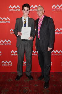 SYDNEY, AUSTRALIA - AUGUST 26: Dr Karl Kruszeinicki (R) presents Luke Cadorin-Taylor with second place in the 'University of Sydney Sleek Geeks Science Eureka Prize - Secondary' at the Australian Museum Eureka Prizes 2015 at Sydney Town Hall on August 26, 2015 in Sydney, Australia. (Photo by Brendon Thorne/Getty Images)