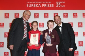 From left to right: Dr Karl Kruszelnicki, Ella Cuthbert (Runner Up of the University of Sydney Sleek Geeks Primary Science Eureka Prize), Harry Driessen (winner of the University of Sydney Sleek Geeks Primary Science Eureka Prize) and Adam Spencer. (Mark Metcalfe/Getty Images)