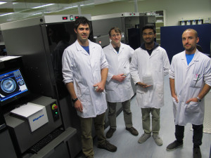 Some members of the research team with the Crystalmation robot (which they use to make the protein crystals) at the Monash Macromolecular Crystallisation Facility (MMCF). L to R Dr Richard Berry, Dr Dene Littler, Mr Gautham Balaji (research assistant) and Mr Felix Deuss (PhD student).