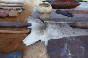 Kangaroo skin clock with wooden tools